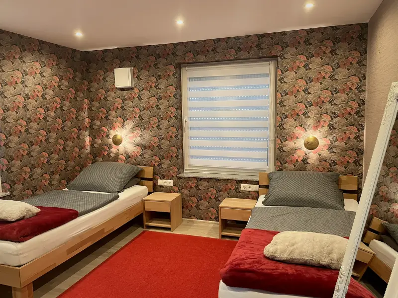 Zweites Schlafzimmer der Ferienwohnung Hanni mit zwei Einzelbetten